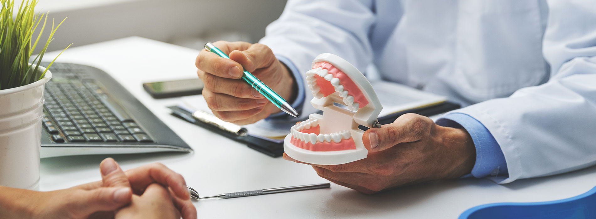 This is a composite image showing medical equipment and supplies, including a stethoscope, blood pressure cuff, tongue depressors, and other instruments, arranged in a manner that suggests they are part of a medical examination or procedure. The background is a solid color to emphasize the items.